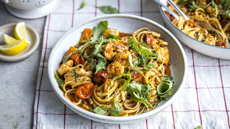 Plump prawns and juicy tomatoes that pop in your mouth make this pasta feel especially summery.