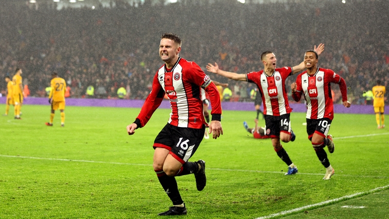 Oliver Norwood celebrates his last-minute winner for Sheffield United