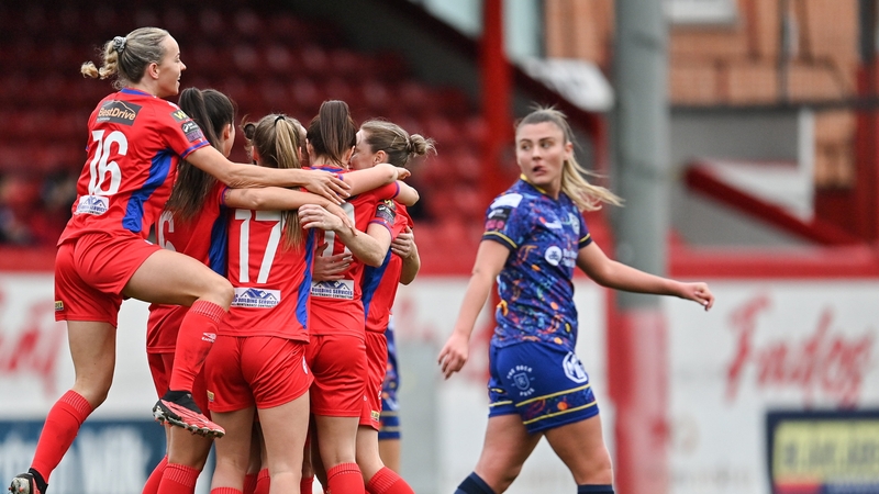 Noelle Murray is congratulated by her Shelbourne teammates after her opener at Tolka Park