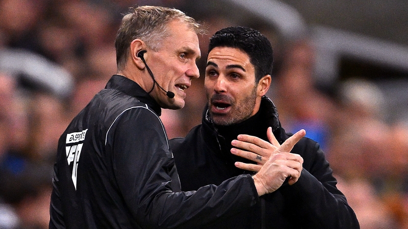 Mikel Arteta talks to fourth official Graham Scott at St. James' Park