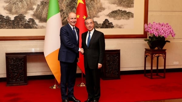 The Tánaiste (L) met China's Foreign Minister in Beijing