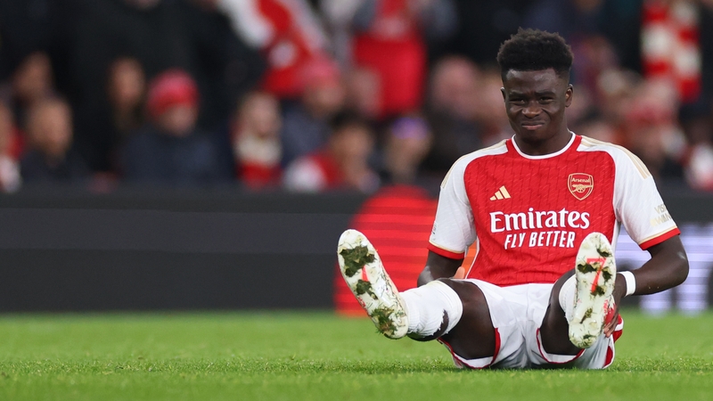 Saka scored the second goal of a 2-0 win over Sevilla before limping off