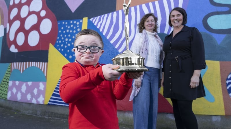 Jack Bolger aged 7, pictured with Mary Cullen, General Manager of Lámh and Jack's mum Niamh Bolger