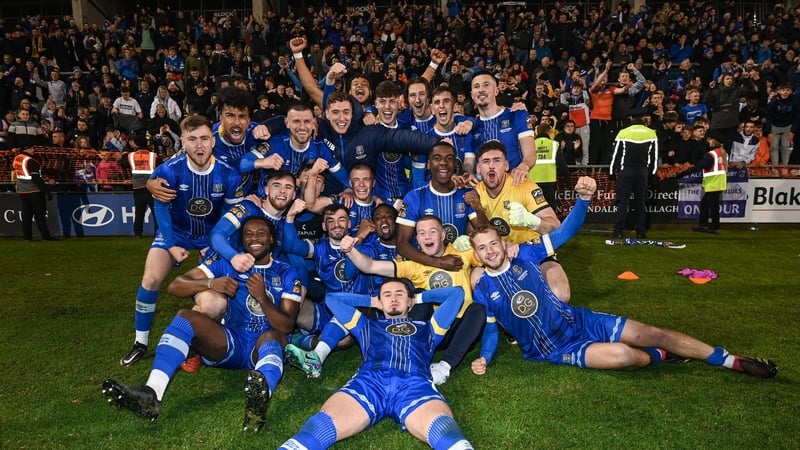 A jubilant Waterford team celebrate at Tallaght Stadium