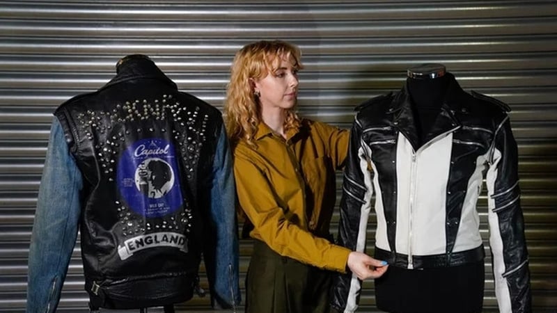 Michael Jackson's custom-made leather jacket from a 1984 Pepsi New Generation commercial and George Michael's screen matched La Rocka Jacket (left) from the music video for I Knew You Were Waiting (For Me. Photo credit: Andrew Matthews/PA Wire