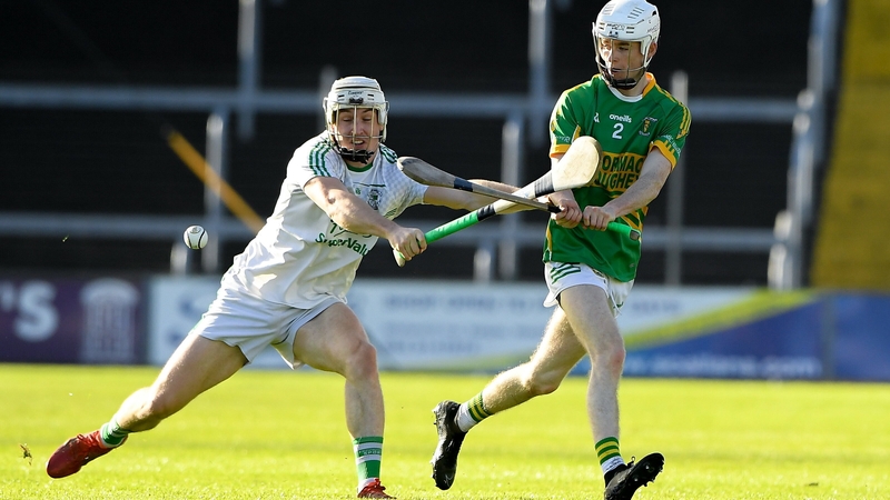 Brecon Kavanagh of Kilcormac-Killoughey and Cathal Dunbar of Naomh Éanna