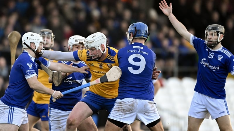 Shane Barrett of Na Fianna in action against Darren Finn and Gary Greville of Raharney
