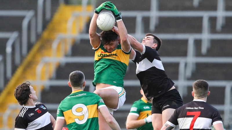 Conal Kennedy of Clonmel Commercials fields a high ball under pressure from Sean Murphy of Newcastle during the Munster club quarter-final