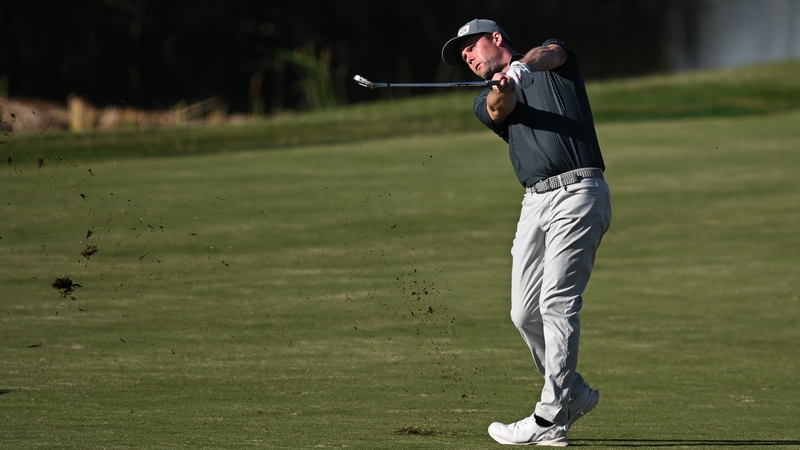 Jonathan Caldwell plays his second shot on the third hole during the final day of action