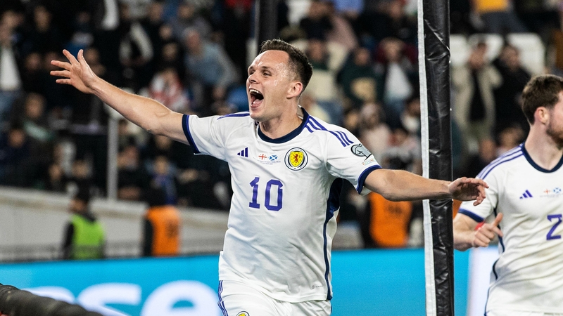 Scotland's Lawrence Shankland celebrates after scoring to make it 2-2