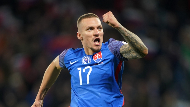 Lukas Haraslin celebrates after scoring Slovakia's fourth goal