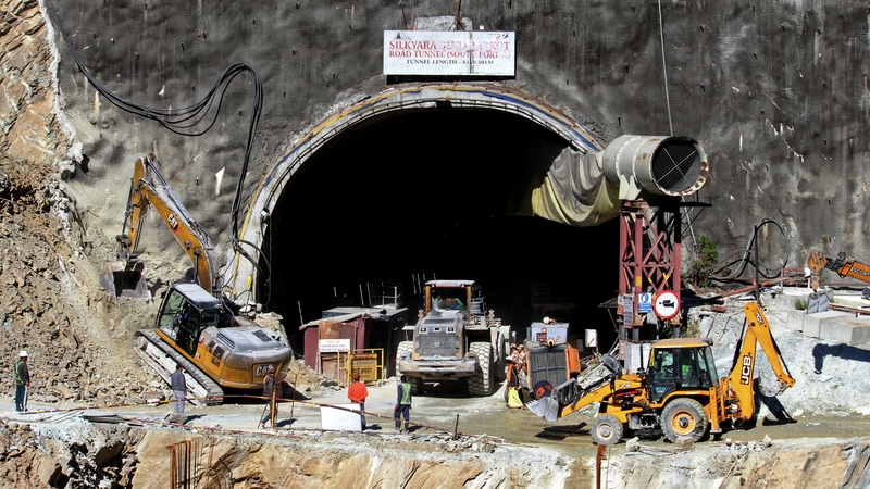 Rescue workers at a road tunnel, days after it collapsed in India's Uttarakhand state