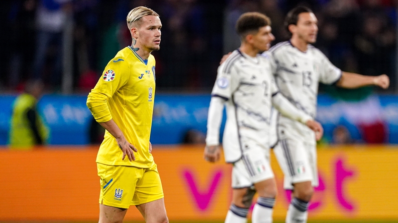 Mykhailo Mudryk (L) and Ukraine were dejected at the final whistle