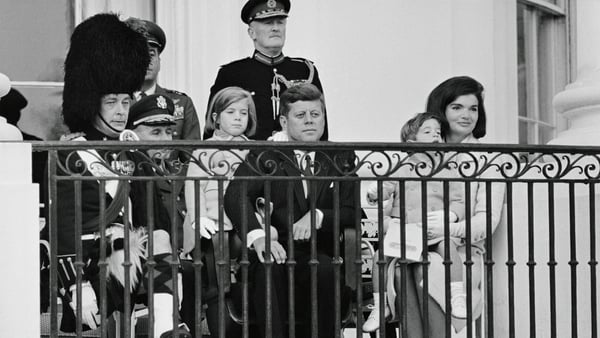 US president John F Kennedy and his family watch the Black Watch band perform at the White House a few days before his assassination. At left is Maj. W.M. Wingate Gray, commander of the Black Watch. Photo: Bettmann/Getty Images