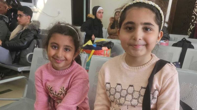 Sahar and Sama El Mokhallalati after making it through the Rafah border crossing into Egypt