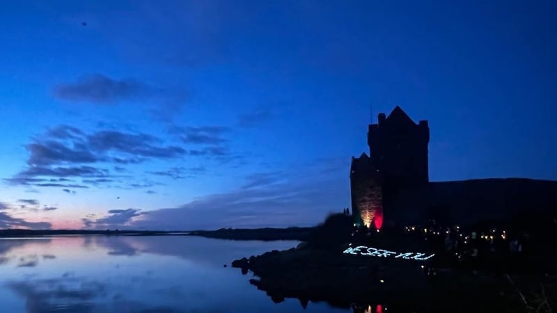A light installation spelled out the words 'WE SEE YOU' on the hill of the castle and visible from the air.