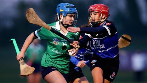 Sarsfields Galway's Siobhan McGrath and Niamh O'Callaghan of Sarsfields Cork
