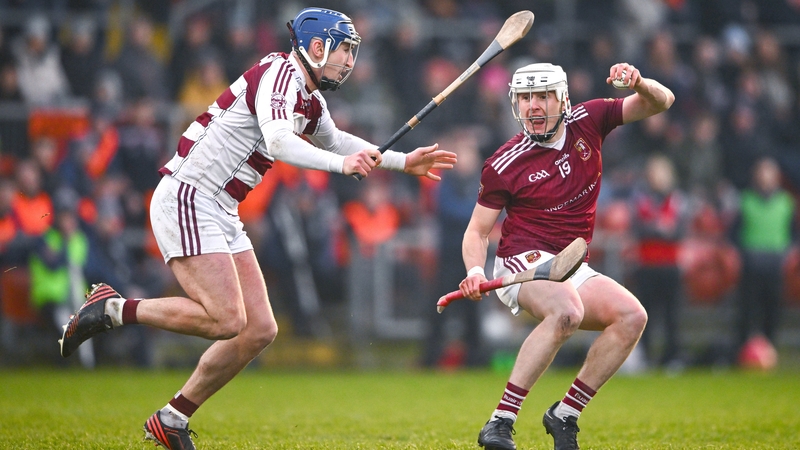 Ruairí Óg Cushendall's Ed McQuillan in action against Slaughtneil's Meehaul McGrath