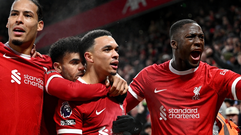 Liverpool players celebrate Trent Alexander-Arnold's dramatic winner against Fulham