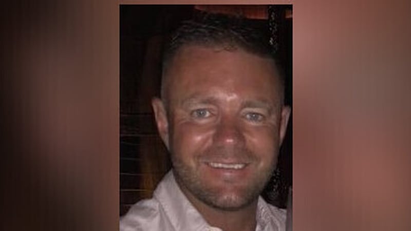 Jim Donegan was shot dead as he waited to collect his 13-year-old son from school