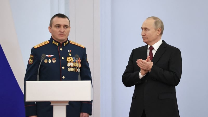 Russian President Vladimir Putin with Lieutenant Colonel Alexander Zavadsky in 2022