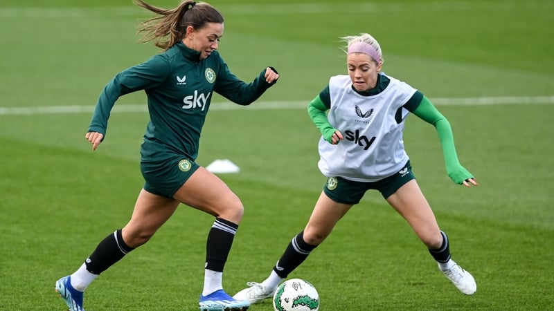 Katie McCabe (L) in action against Denise O'Sullivan during a Republic of Ireland training
