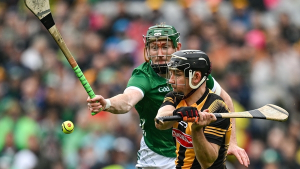 Richie Hogan (R) is tracked by Limerick's William O'Donoghue in July's All-Ireland final