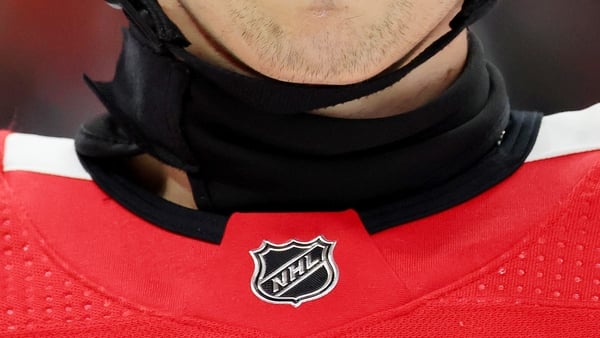NHL player Wyatt Kaiser of the Chicago Blackhawks wears a neck guard last month