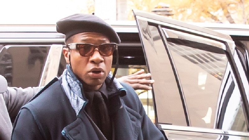 Jonathan Majors arriving at court in New York on Monday