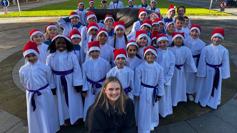RTÉ news2day presenter Molly O'Connor with the Palestrina Choir. Pictures: Micheál Mac Suibhne