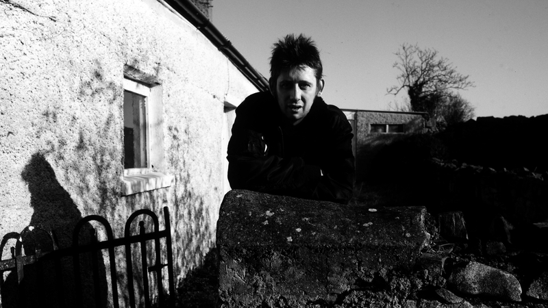 Shane MacGowan outside the family home in Co Tipperary in 1997. Photo: Martyn Goodacre/Getty Images