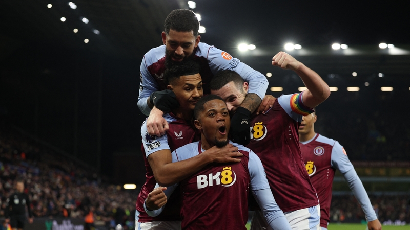 Leon Bailey (C) celebrates with his Aston Villa team-mates after scoring the winner