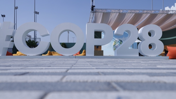 A COP28 logo stands in the Green Zone of the COP28 Climate Conference in Dubai