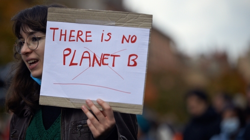 A climate activist in Toulouse, France protesting in response to the COP28 negotiations in recent days