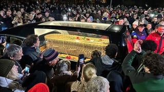 Crowds pay their respects as the coffin of Shane MacGowan leaves St Mary's of the Rosary Church in Nenagh (Pic: RollingNews.ie)