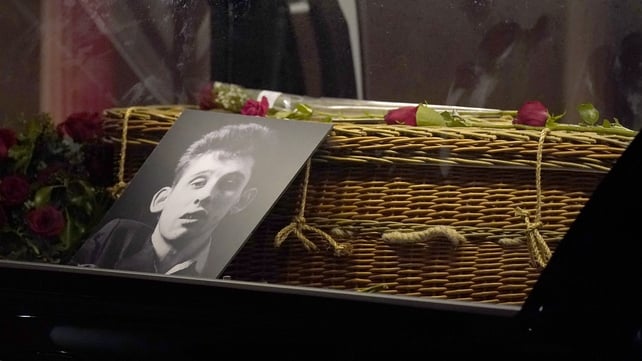The coffin of Shane MacGowan passes Philip Ryan's Pub following his funeral in Nenagh, Co Tipperary. The Pogues frontman died on 30 November at the age of 65 following a long illness.