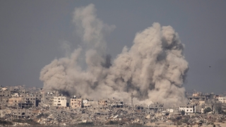 An explosion in southern Gaza photographed from Israel