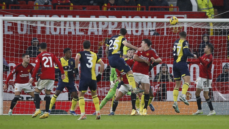 Marcos Senesi heads home Bournemouth's third