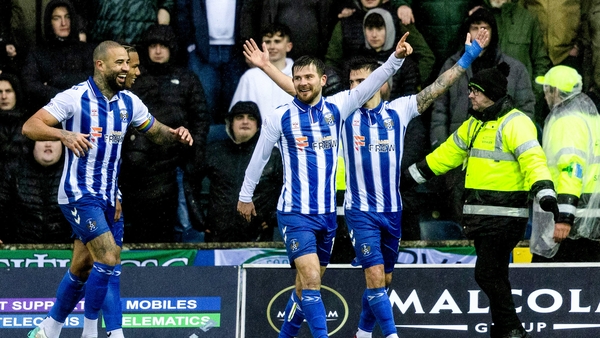 Matty Kennedy (c) celebrates his winning goal