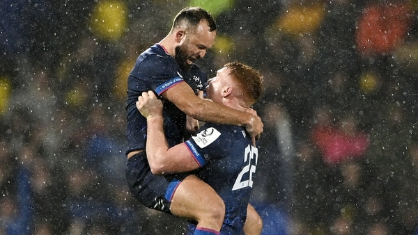 Jamison Gibson-Park and Ciarán Frawley (r) celebrate at the final whistle