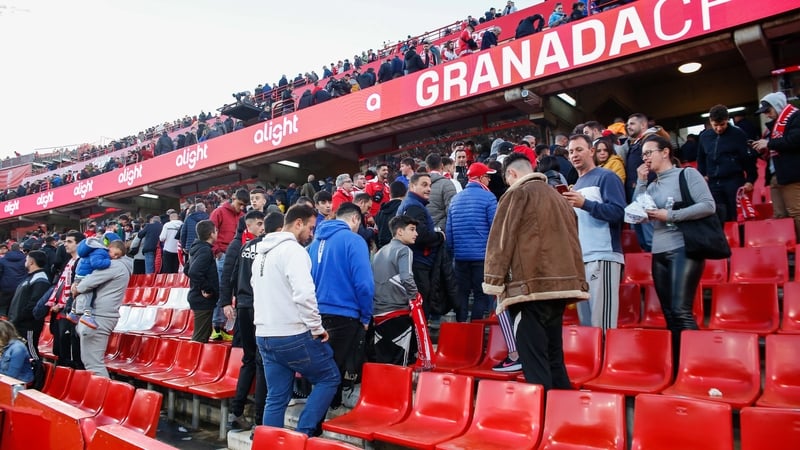 Fans leave the stadium after La Liga decided to cancel the match