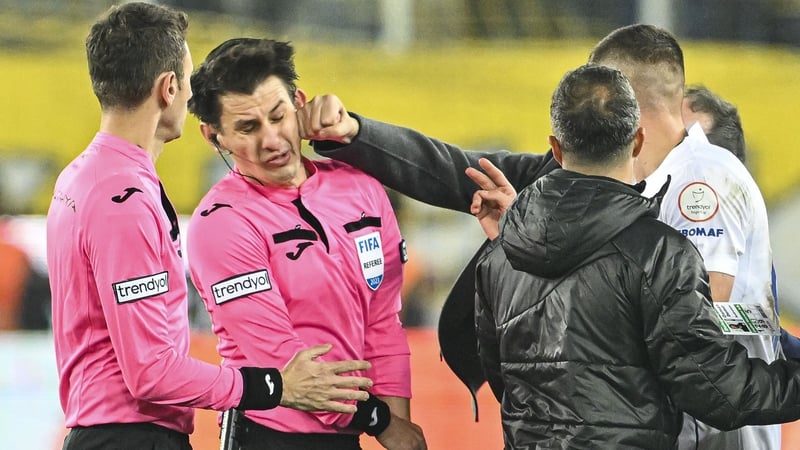 MKE Ankaragucu president Faruk Koca's blow connects with the cheekbone of referee Halil Umut Meler