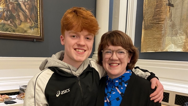 Ruaidhrí Condon with his mother Deirdre after winning the Zurich Young Portrait Prize