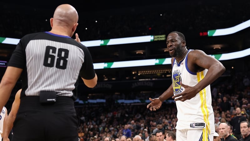 Draymond Green reacts after being ejected for the flagrant foul