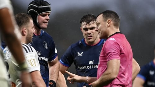 James Ryan (l) and Garry Ringrose (c) talk to referee Matthew Carley