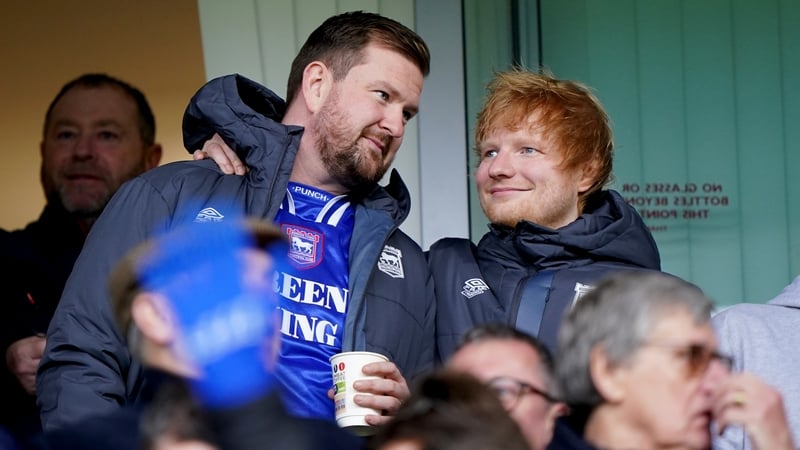 Sheeran (right) watching Ipswich Town
