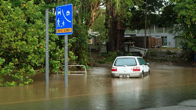 A car inundated with water in the northern beaches suburb of Holloways Beach in Cairns