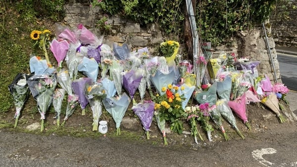 Flowers lain in tribute outside the Hillview Sports Club in Clonmel following the deaths of four young people in a car crash