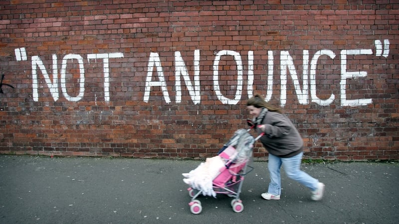 Graffiti in West Belfast, a reaction to demands for the IRA to decommission weapons and explosives