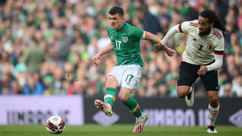 Jason Knight up against Jason Denayer during Ireland's friendly with Belgium in 2022